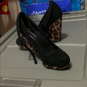 Cheetah size 6 1/2 wedges . Lightly worn .